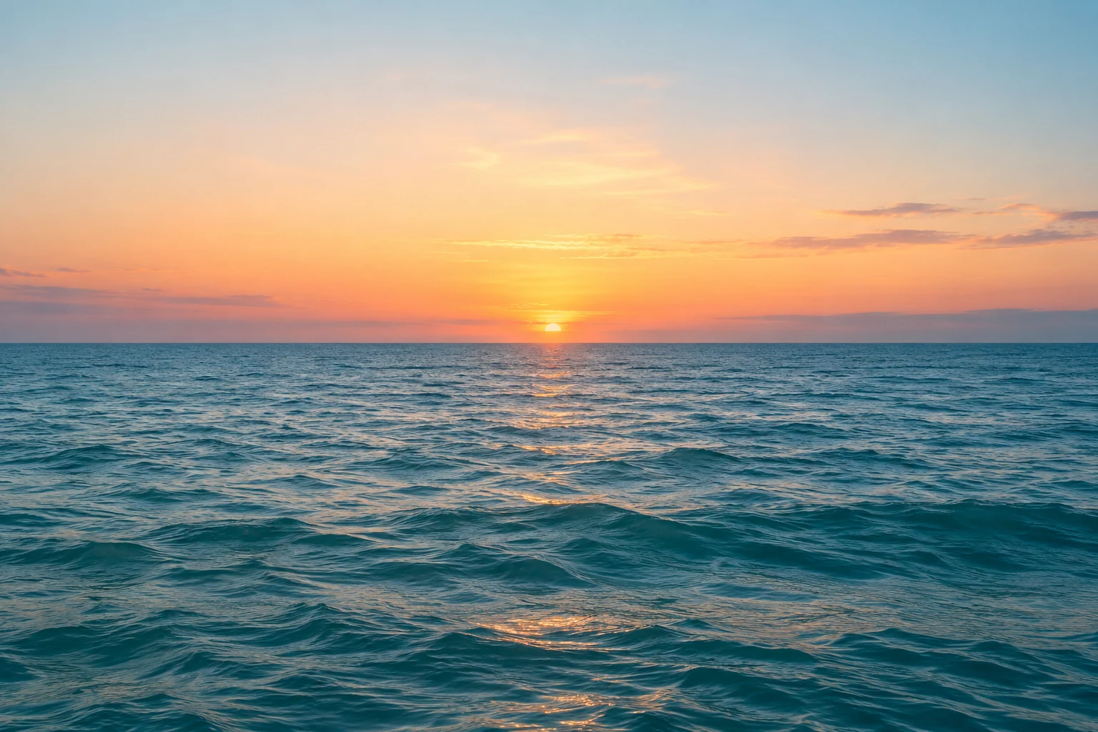 A calm ocean horizon at dawn