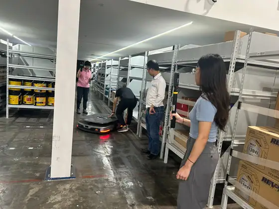 Autonomous mobile robot logistics in a warehouse