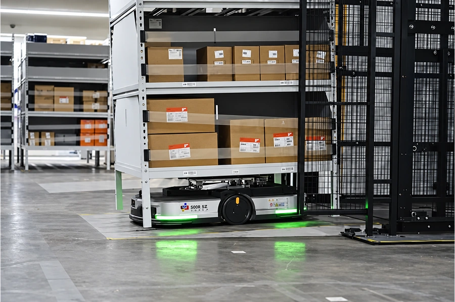 Autonomous mobile robot logistics in a warehouse